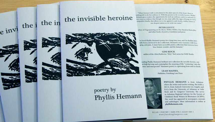 Copies of the poetry chapbook THE INVISIBLE HEROINE by Phyllis Hemann